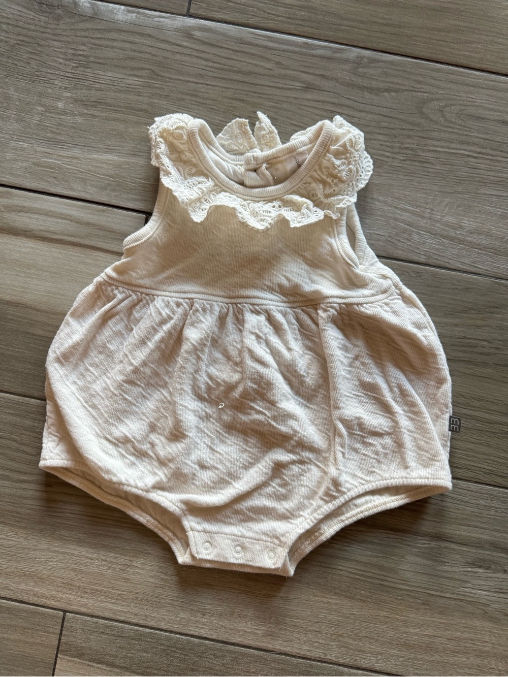 Lace-Trim Baby Romper in Cream